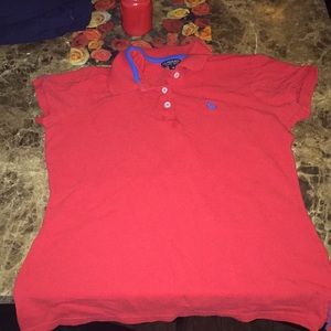 Women’s red polo shirt